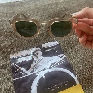 MOSCOT Lemtosh clear/gold frame sunglasses with green lenses